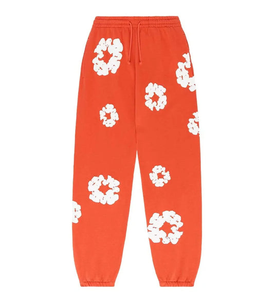 DENIM TEARS COTTON WREATH SWEATPANTS ORANGE